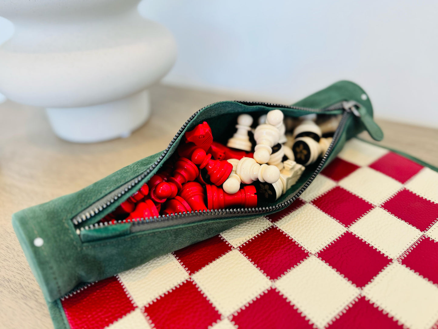 Premium leather storage compartment with magnetic chess pieces