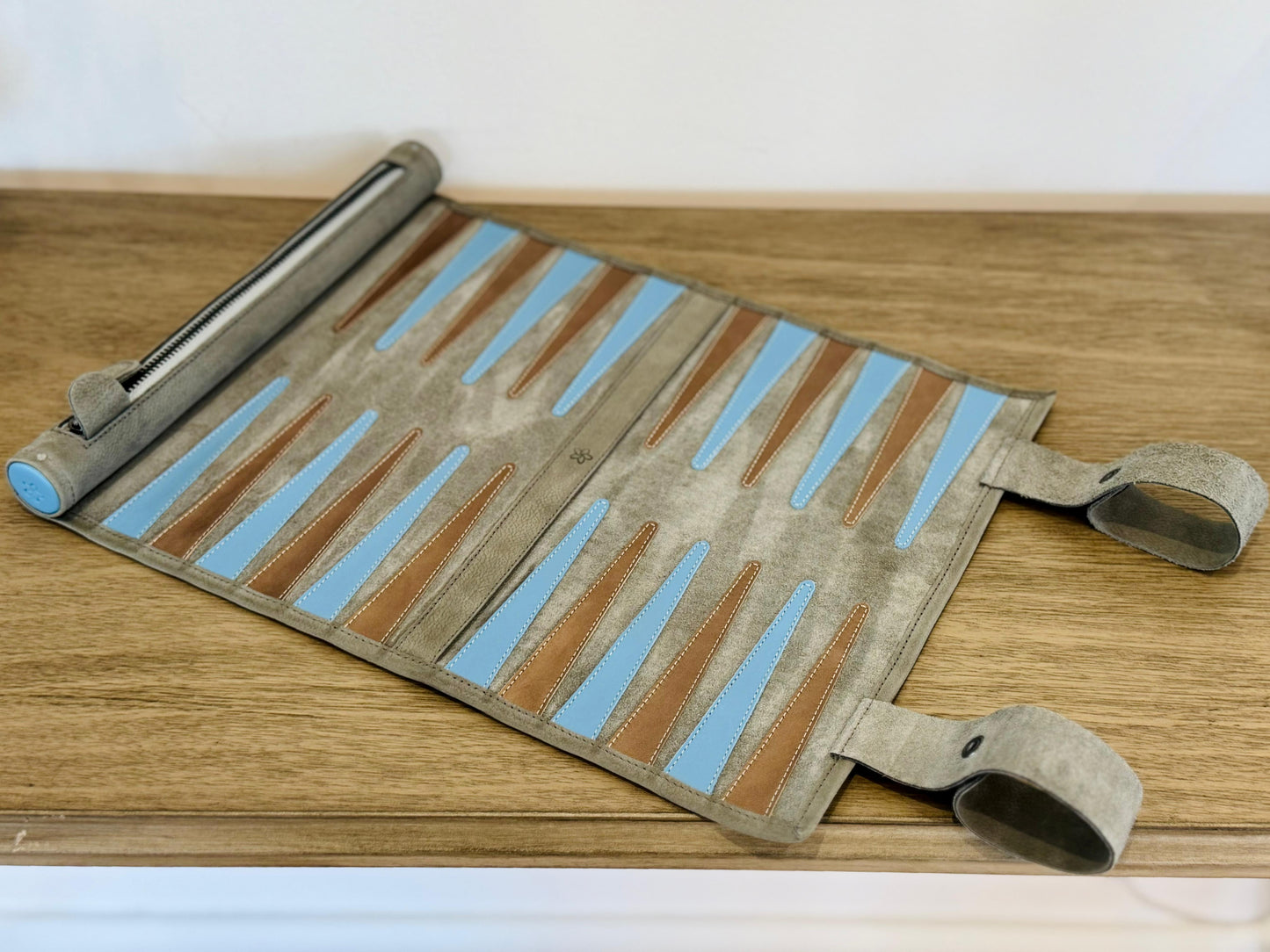 Open MELIA Champagne leather backgammon board with blue and brown details