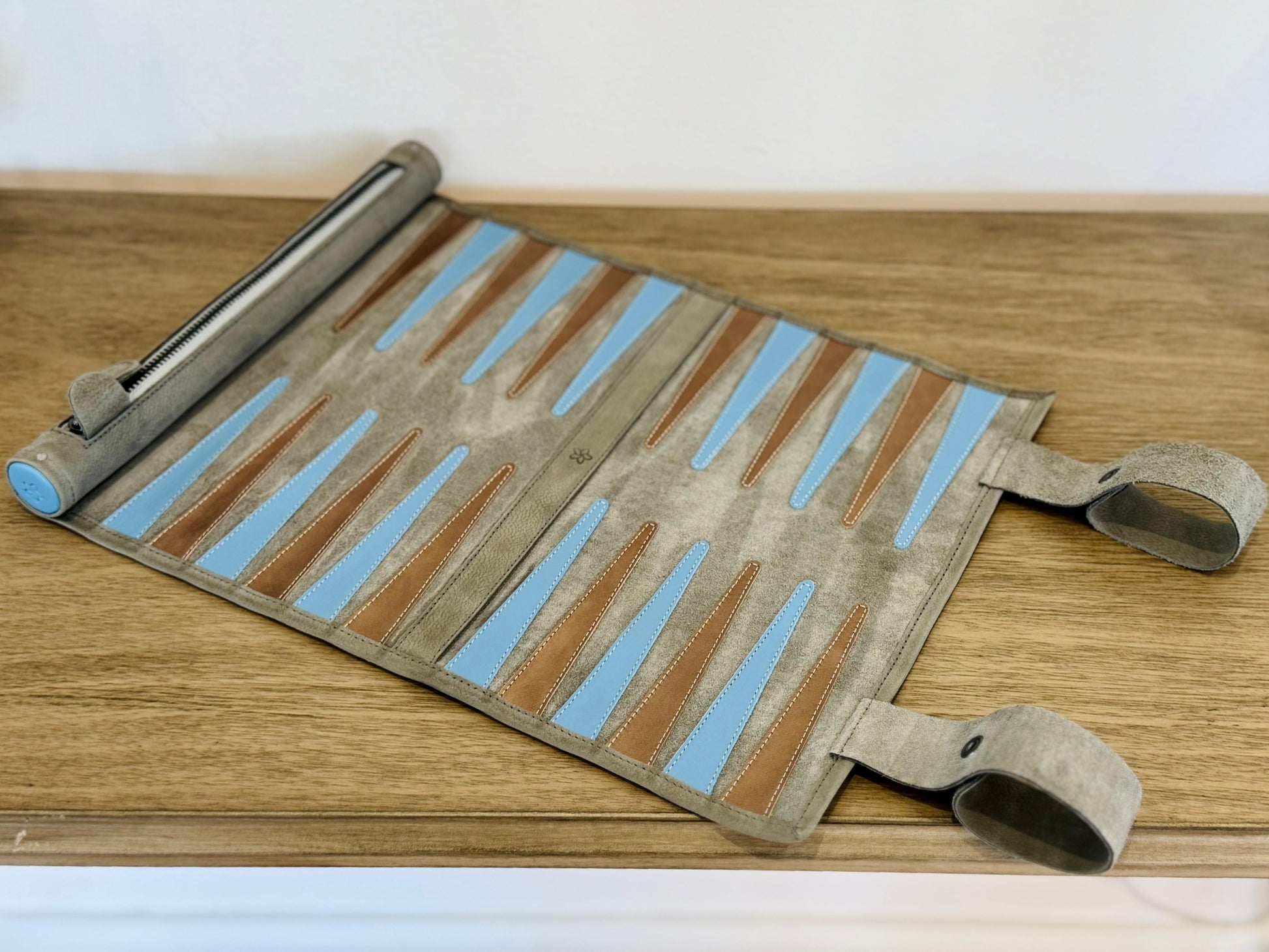Open MELIA Champagne leather backgammon board with blue and brown details