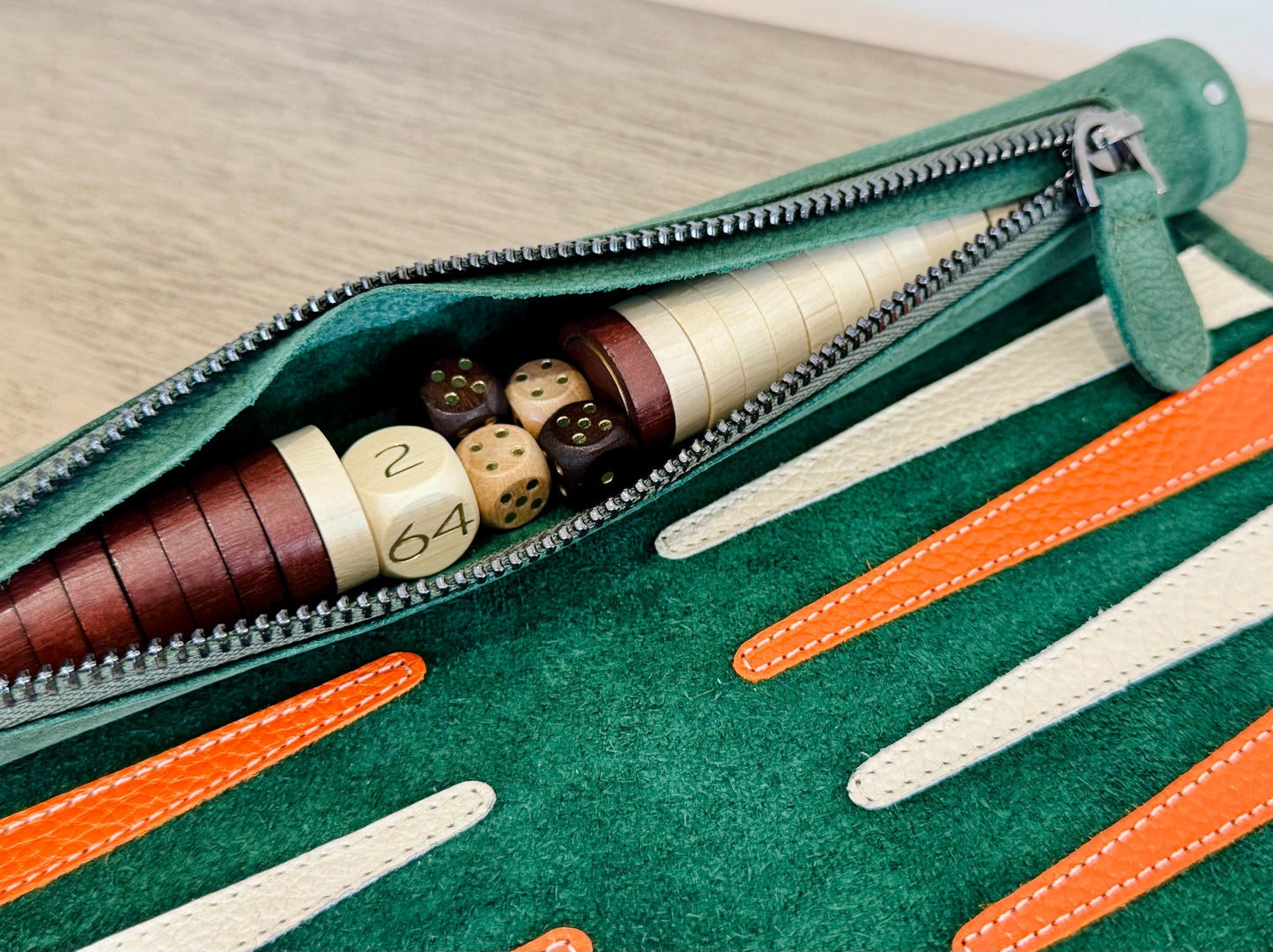 Integrated leather storage with wooden checkers inside MELIA Eire backgammon set