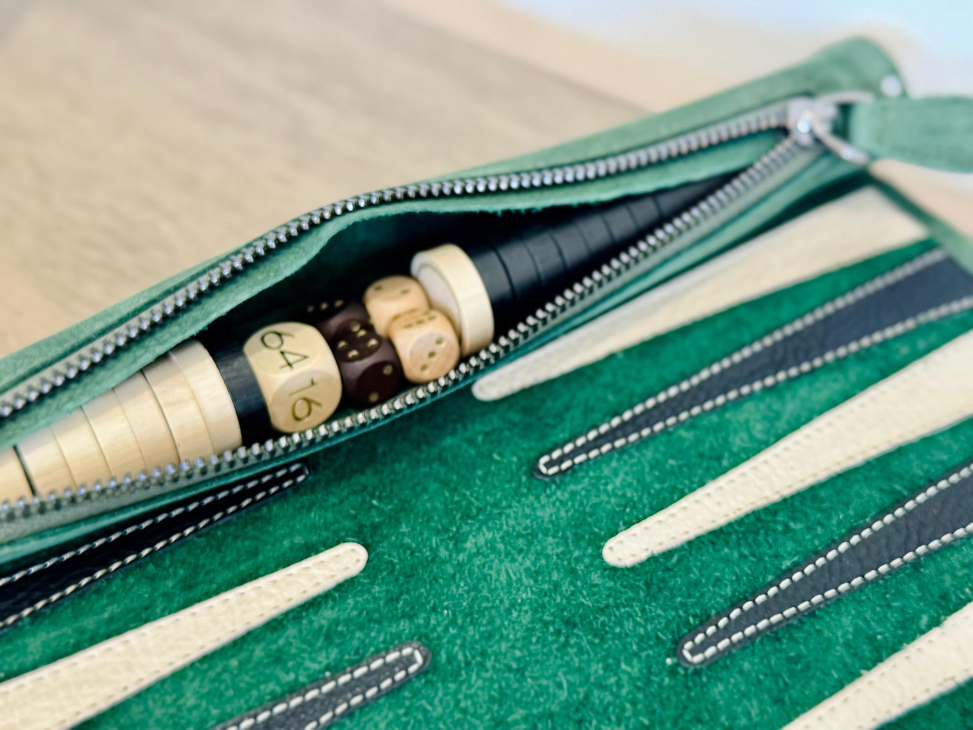 Integrated leather storage with wooden checkers inside MELIA Geneve backgammon set