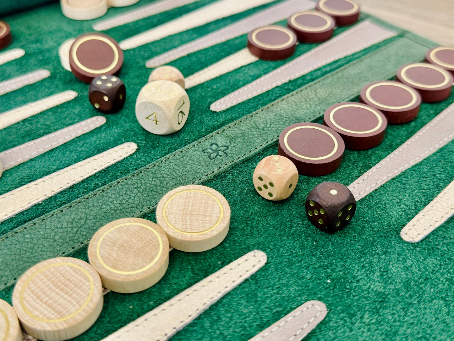 Grande Dame green nubuck backgammon board with cream and brown wooden playing pieces