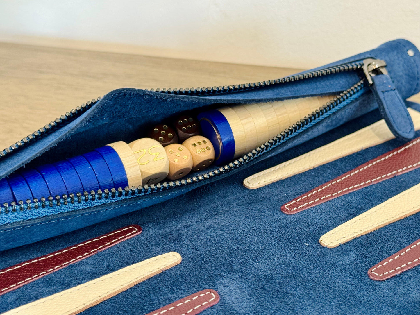 Blue nubuck leather MELIA Les Bleus backgammon set opened for play