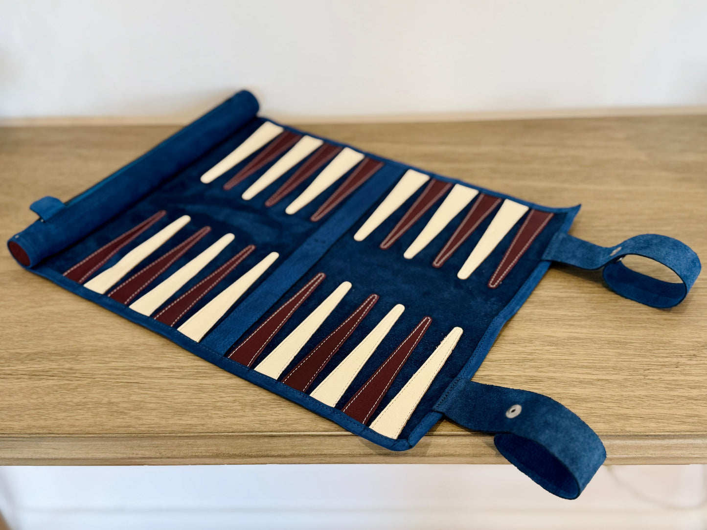 Leather craftsmanship and material details of the MELIA Les Bleus backgammon set