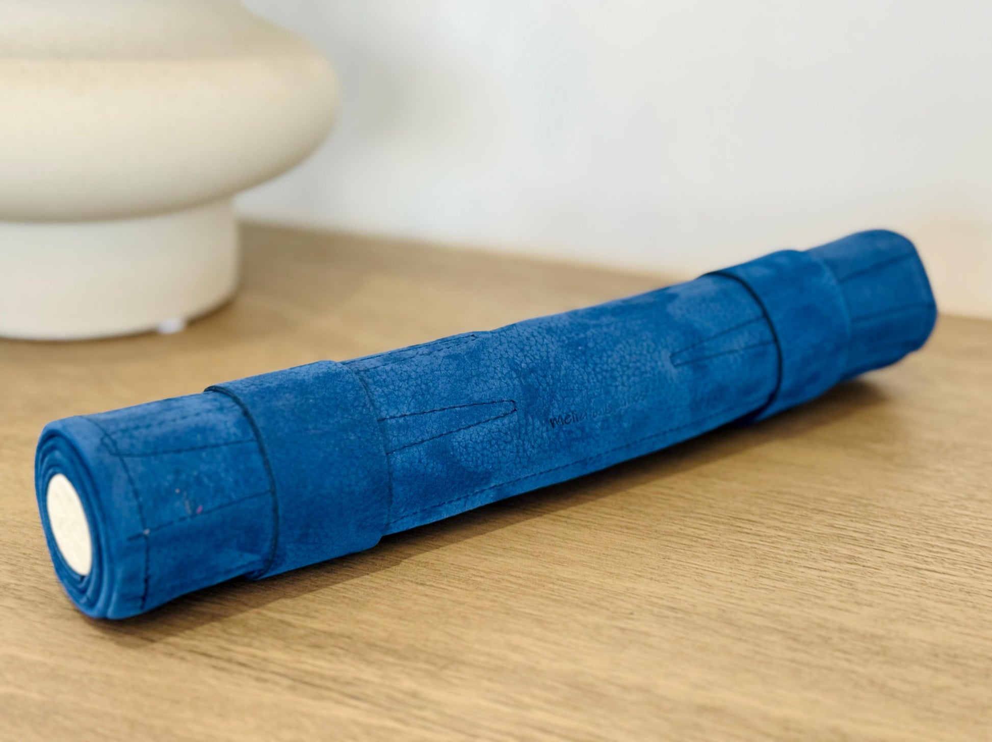 MELIA Les Bleus blue leather backgammon set rolled for travel