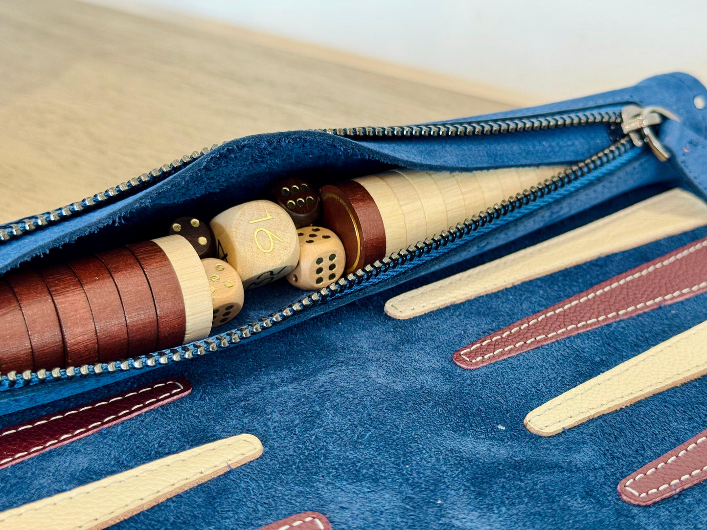 Wooden backgammon checkers with gold detailing for MELIA Les Bleus