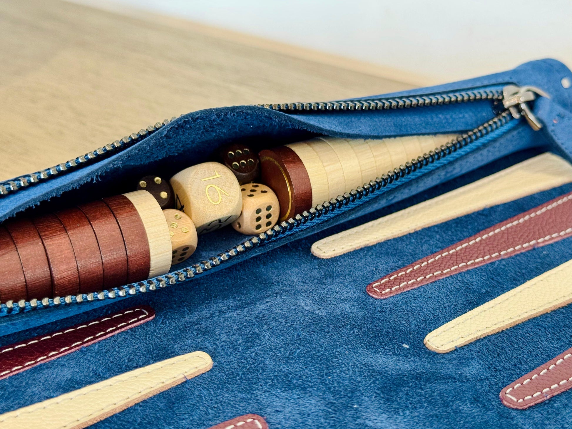 Wooden backgammon checkers with gold detailing for MELIA Les Bleus