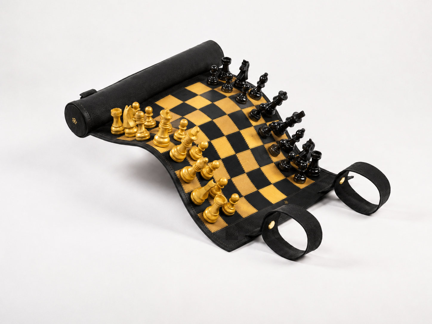 Luxury roll-up magnetic leather chess set Pharaoh in black floater leather with gold and black chess pieces