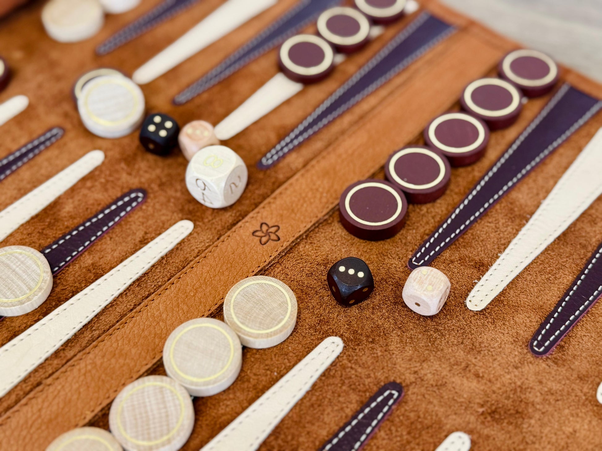 Whiskey nubuck leather backgammon board with wooden playing checkers