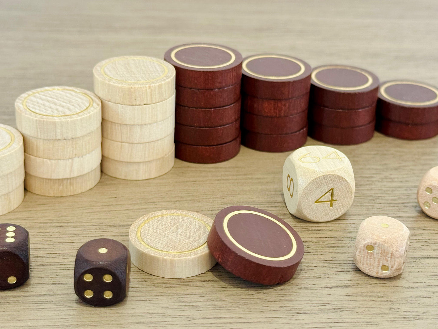 Premium wooden backgammon checkers from the MELIA roll-up edition
