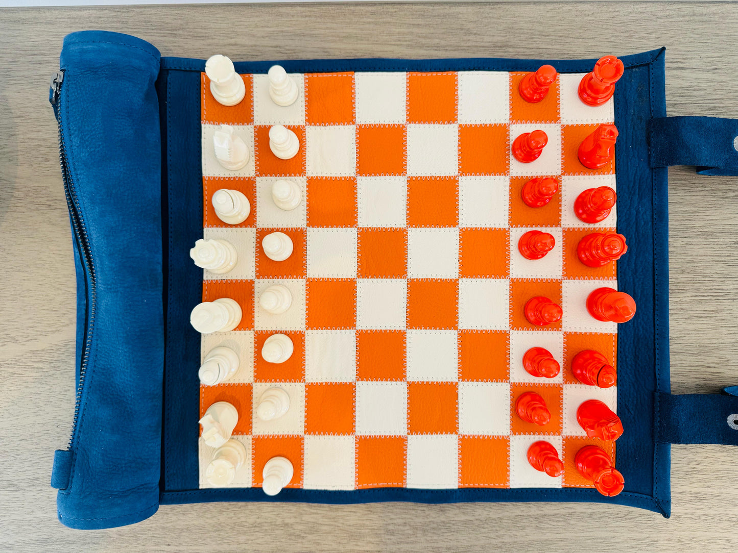 Top view of the Tropicana orange and ivory magnetic chess board