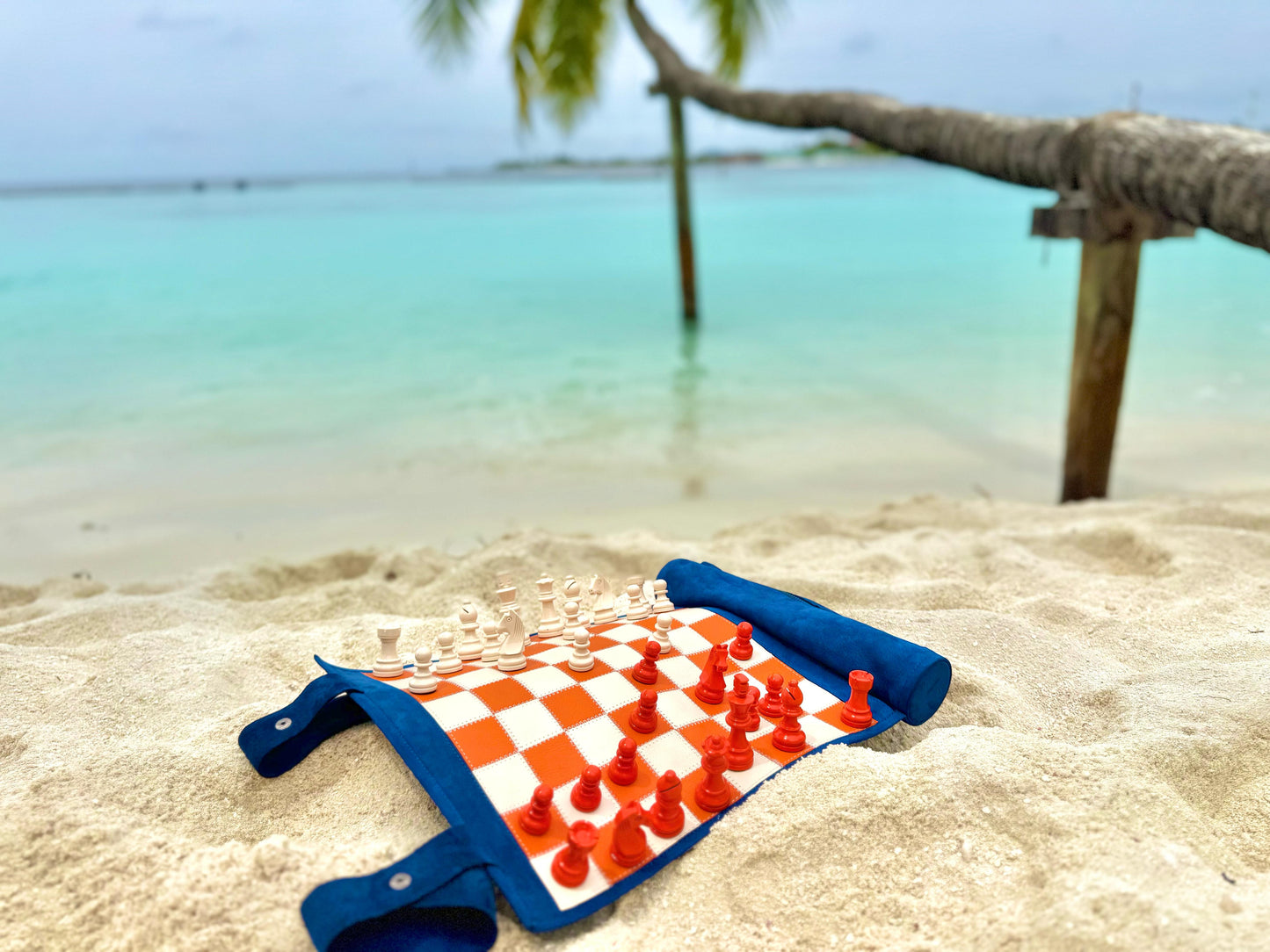 Tropicana magnetic chess set on a tropical beach